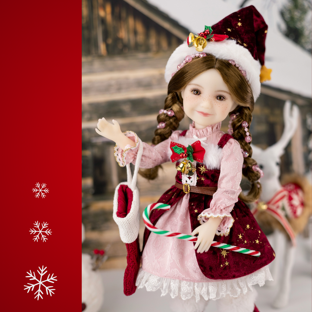 Ruby Red 2025 Holiday Edition Doll Angel in red and pink Christmas themed dress.