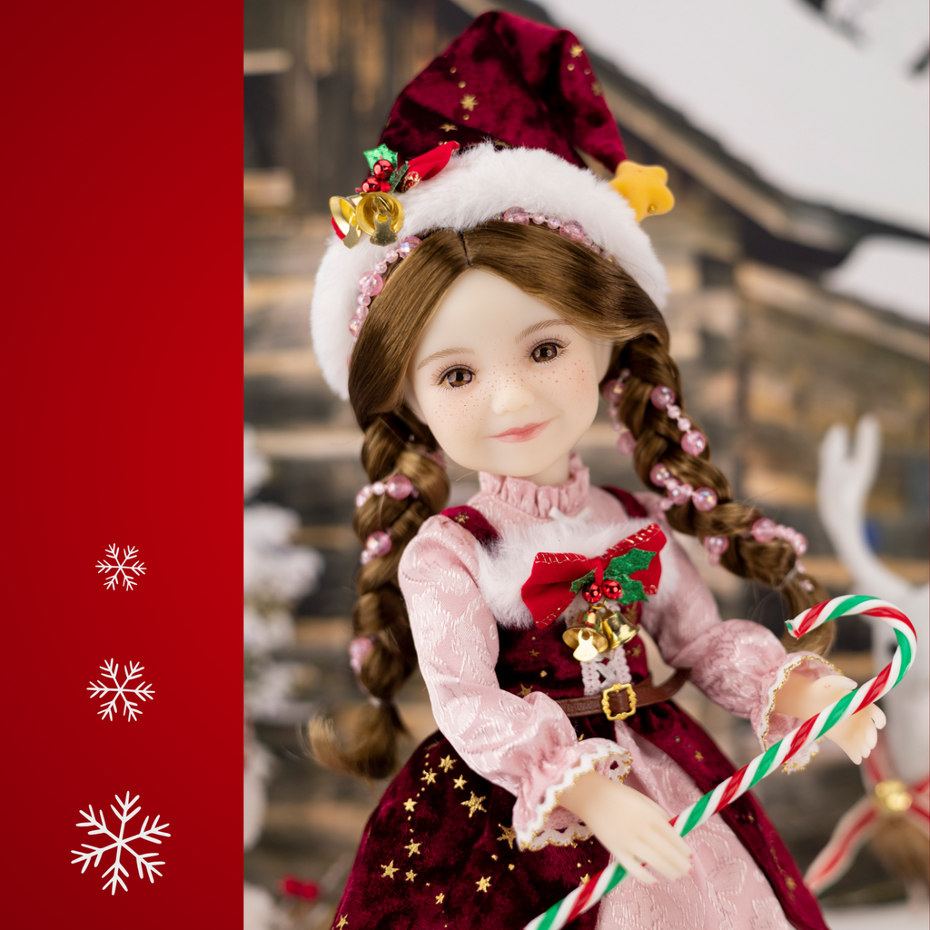Ruby Red 2025 Holiday Edition Doll Angel in red and pink Christmas themed dress.