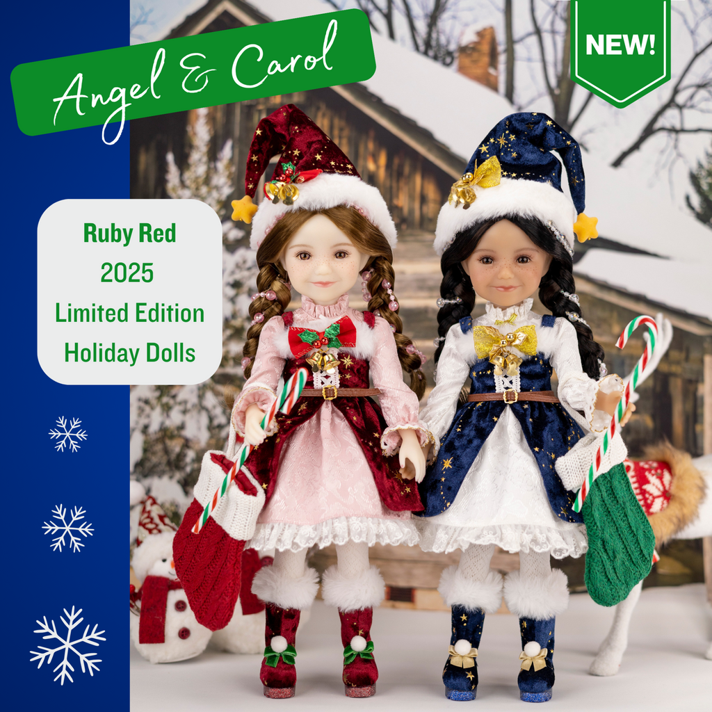 Ruby Red 2025 Holiday edition doll Carol, with festive blue and white outfit and accessories, surrounded by Christmas decorations.