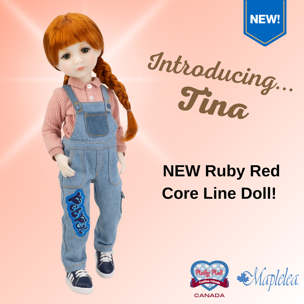 New ruby red core line doll Tina, wearing salmon coloured button up shirt and overalls with blue lace up sneakers.
