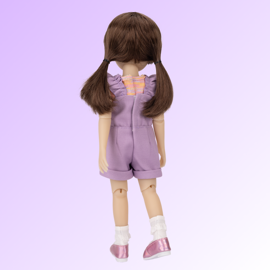 New Ruby Red doll named Tracy wearing a purple outfit.